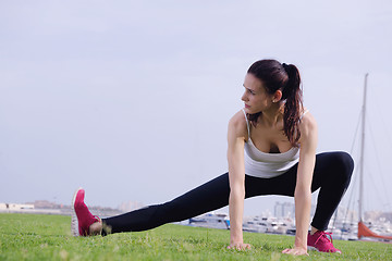 Image showing Young beautiful  woman jogging  on morning