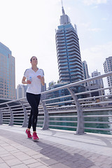 Image showing woman jogging at morning