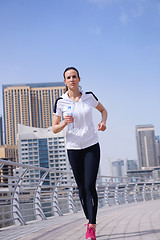 Image showing woman jogging at morning