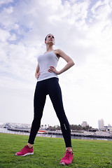 Image showing Young beautiful  woman jogging  on morning