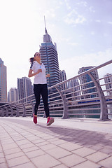 Image showing woman jogging at morning