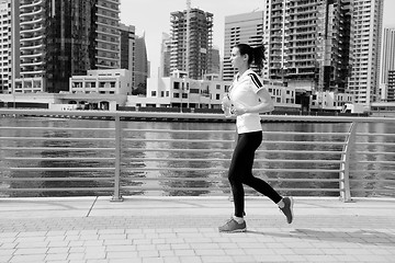 Image showing woman jogging at morning