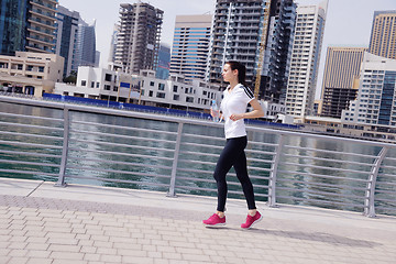 Image showing woman jogging at morning