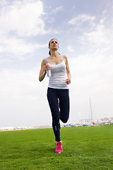 Image showing woman jogging at morning