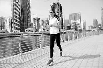 Image showing woman jogging at morning