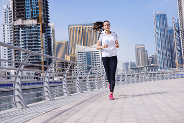 Image showing woman jogging at morning