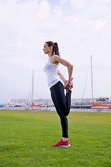 Image showing Young beautiful  woman jogging  on morning