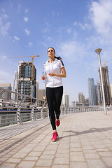 Image showing woman jogging at morning