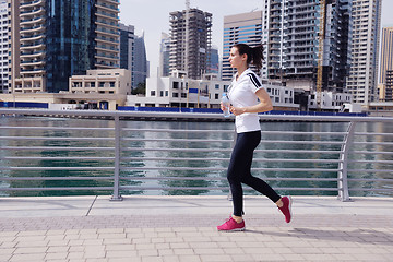 Image showing woman jogging at morning