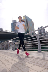 Image showing woman jogging at morning