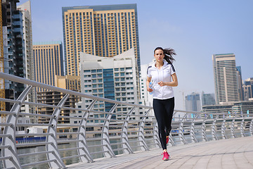 Image showing woman jogging at morning