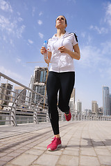 Image showing woman jogging at morning