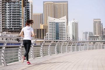 Image showing woman jogging at morning