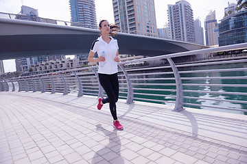 Image showing woman jogging at morning