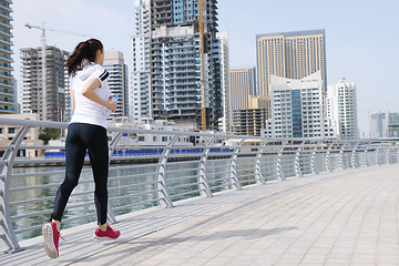 Image showing woman jogging at morning