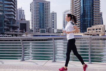 Image showing woman jogging at morning