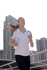 Image showing woman jogging at morning