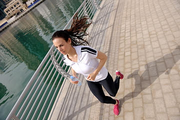 Image showing woman jogging at morning