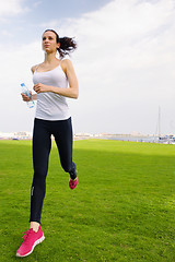 Image showing woman jogging at morning