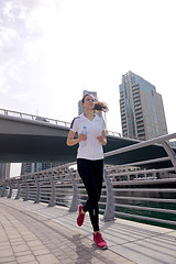 Image showing woman jogging at morning