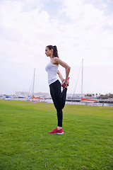 Image showing Young beautiful  woman jogging  on morning