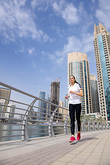 Image showing woman jogging at morning