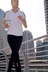 Image showing woman jogging at morning