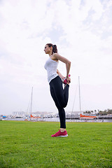 Image showing Young beautiful  woman jogging  on morning