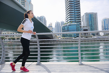 Image showing woman jogging at morning