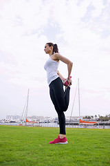 Image showing Young beautiful  woman jogging  on morning