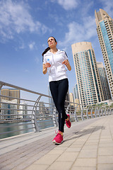 Image showing woman jogging at morning