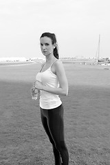 Image showing Young beautiful  woman jogging  on morning