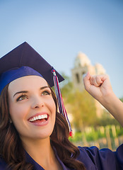 Image showing Happy Graduating Mixed Race Woman In Cap and Gown