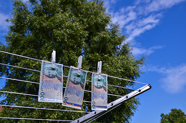 Image showing Drying bank notes