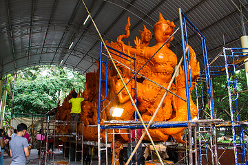 Image showing UBONRATCHATHANI, THAILAND - JULY 23: Candles are carved out of w