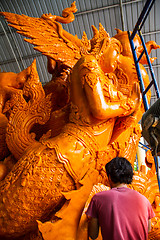 Image showing UBONRATCHATHANI, THAILAND - JULY 23: Candles are carved out of w