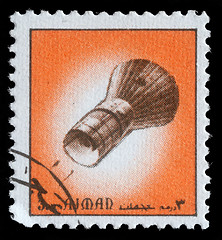 Image showing Stamp printed in emirate Ajman show spaceship