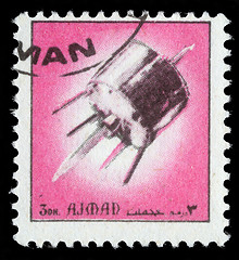 Image showing Stamp printed in emirate Ajman show spaceship