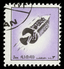 Image showing Stamp printed in emirate Ajman show spaceship
