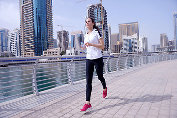 Image showing woman jogging at morning