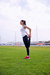 Image showing Young beautiful  woman jogging  on morning