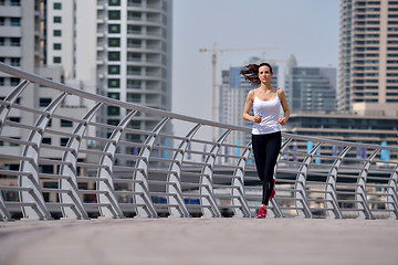 Image showing woman jogging at morning