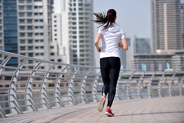 Image showing woman jogging at morning