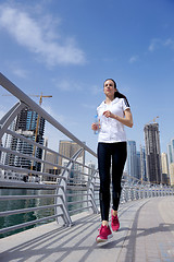 Image showing woman jogging at morning