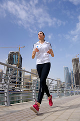 Image showing woman jogging at morning