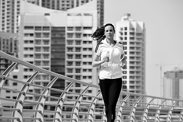 Image showing woman jogging at morning