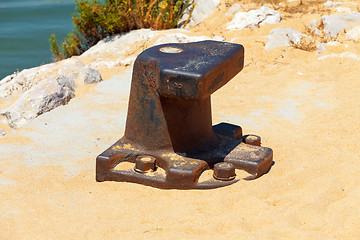 Image showing Old bollard at the pier