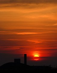 Image showing beautiful sunrise with factory in the foreground