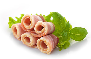 Image showing bacon rolls and basil