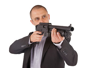 Image showing Mafia man is holding a shotgun